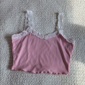 Pink ribbed crop top with white lace trim